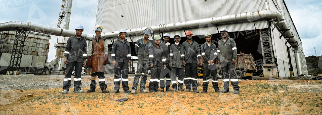 Abantu Africa Steel Mills local employees and international technical specialists working together on the facility floor